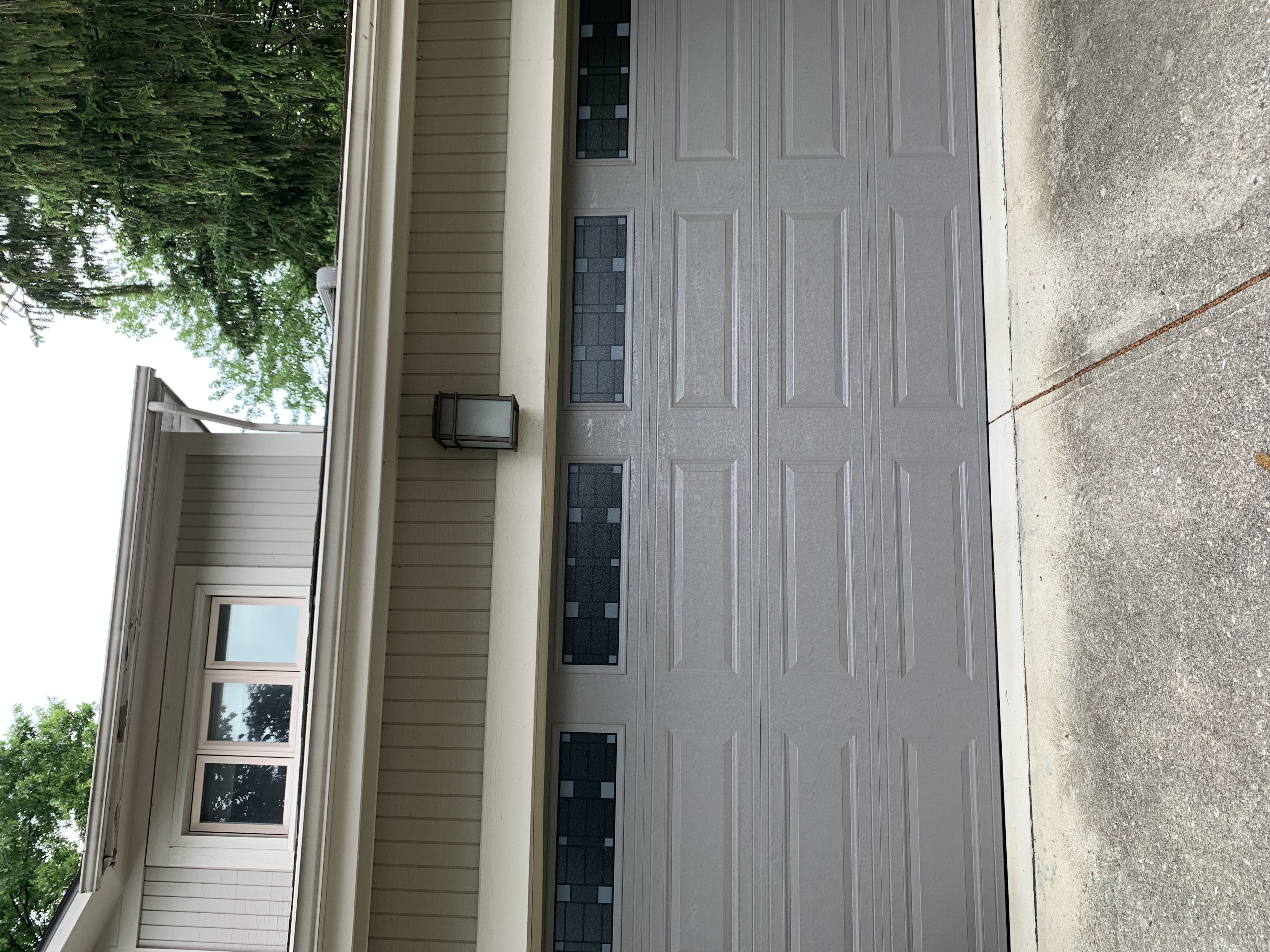 House Repairs New Garage with House in need of paint